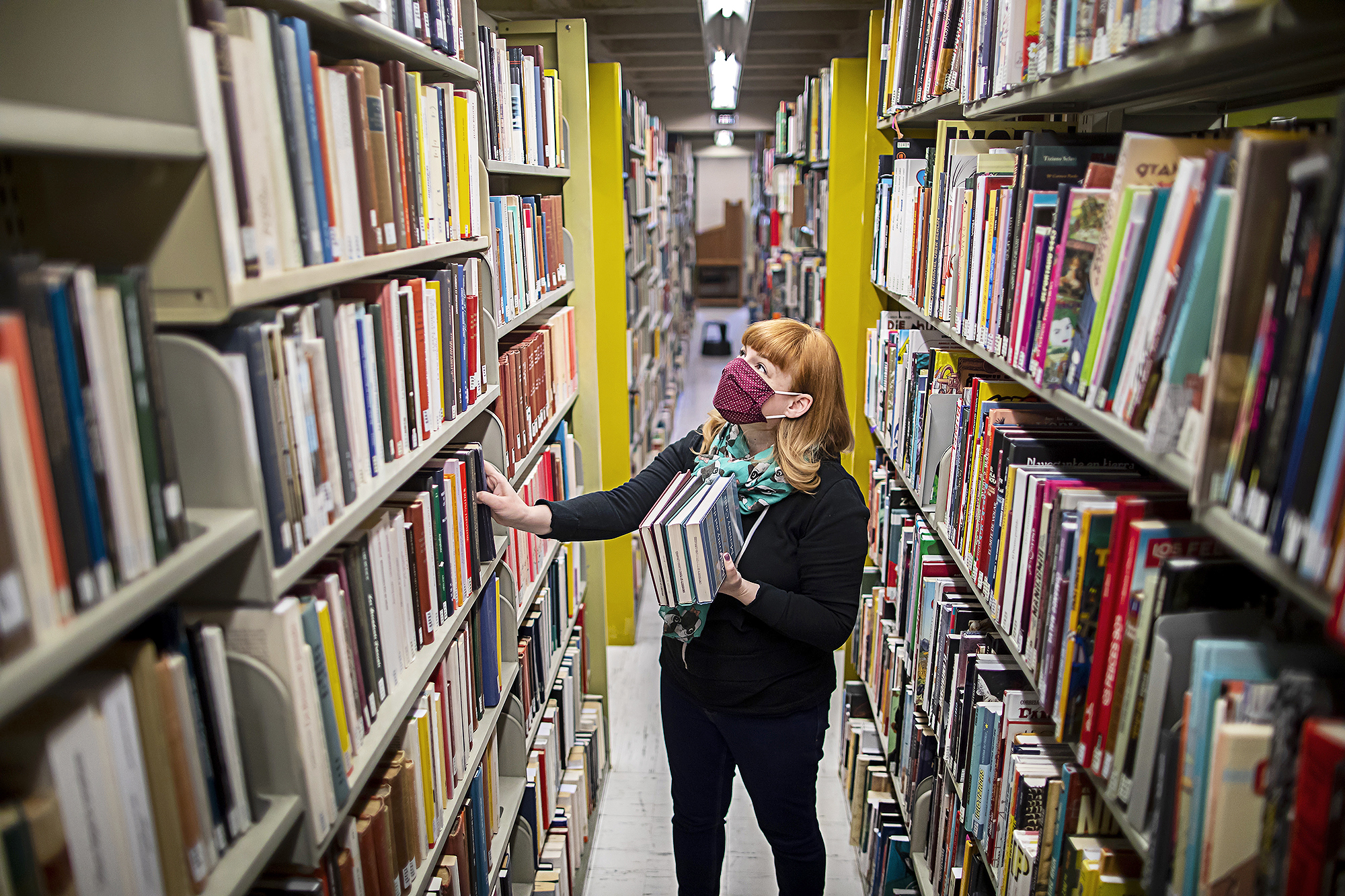 student in library