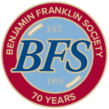 An illustration of a red and blue BFS medallion, featuring the words 'Benjamin Franklin Society - 70 Years' around the border and 'Est. 1955' in the inner portion.