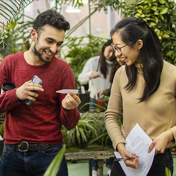 Biology students in the greenhouse