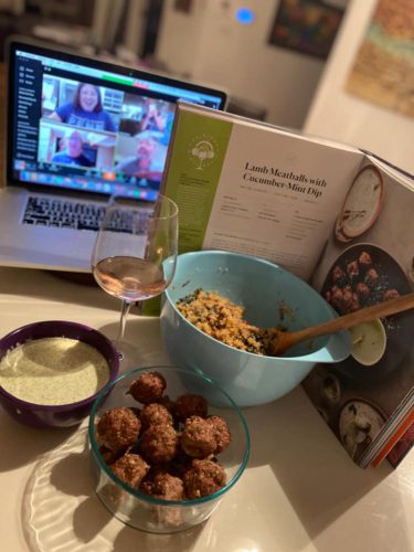 Photo of food in from of computer virtual chat