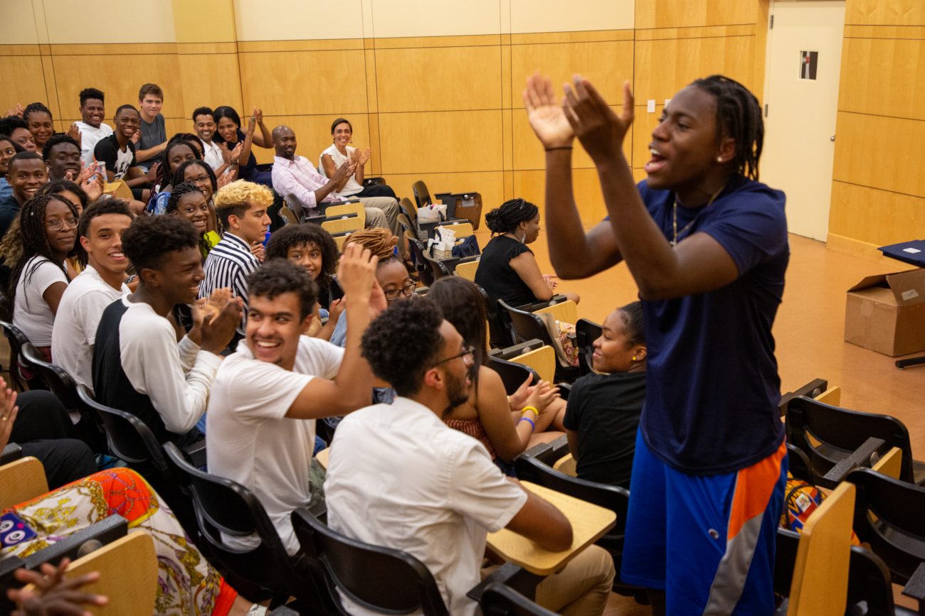 Enthusiastic students clapping