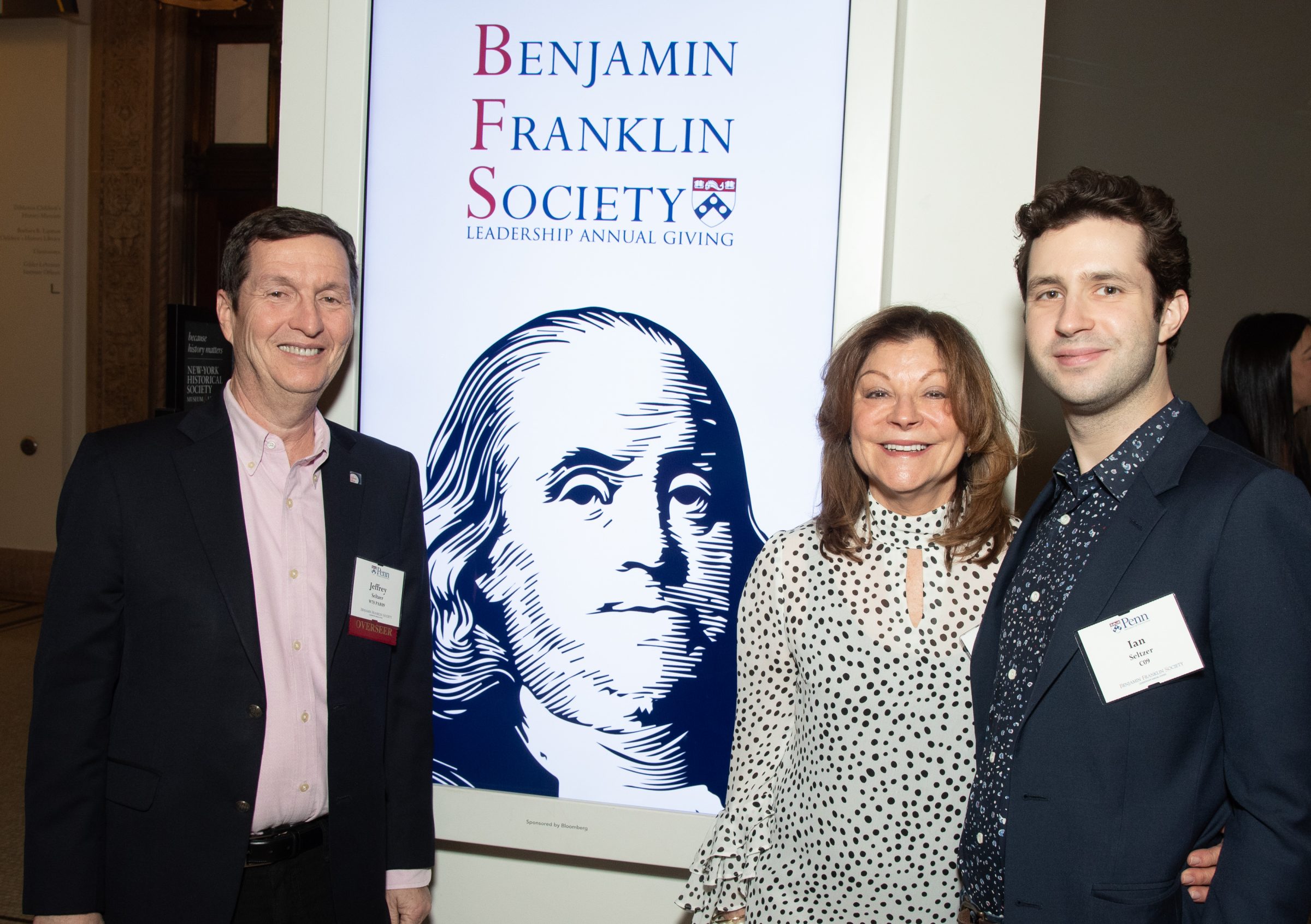 three people at an event