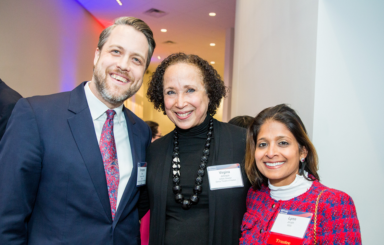 three people at an event