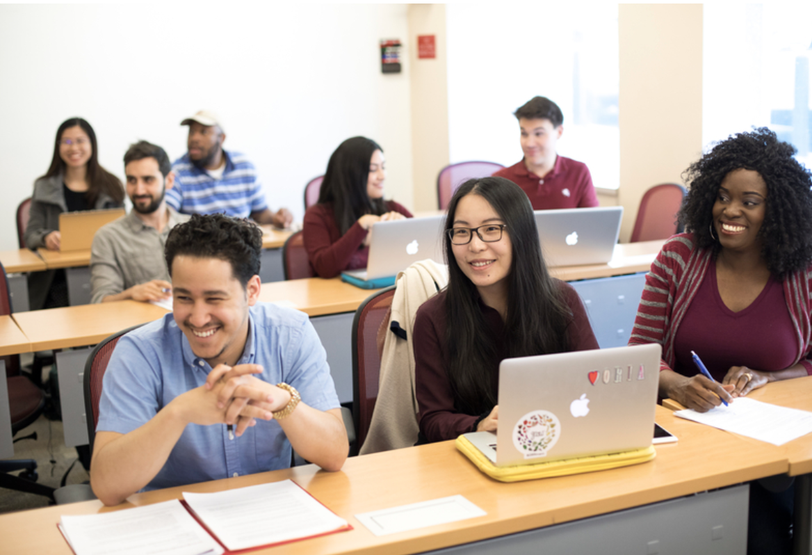 A group of students at the University of Pennsylvania's Graduate School of Education work collaboratively with their peers to develop innovative ideas for the field.