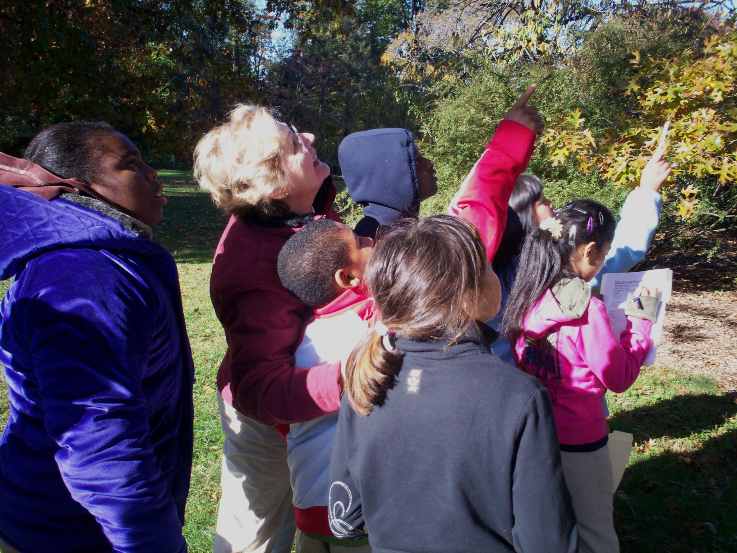 students on a tour of the Arboretum
