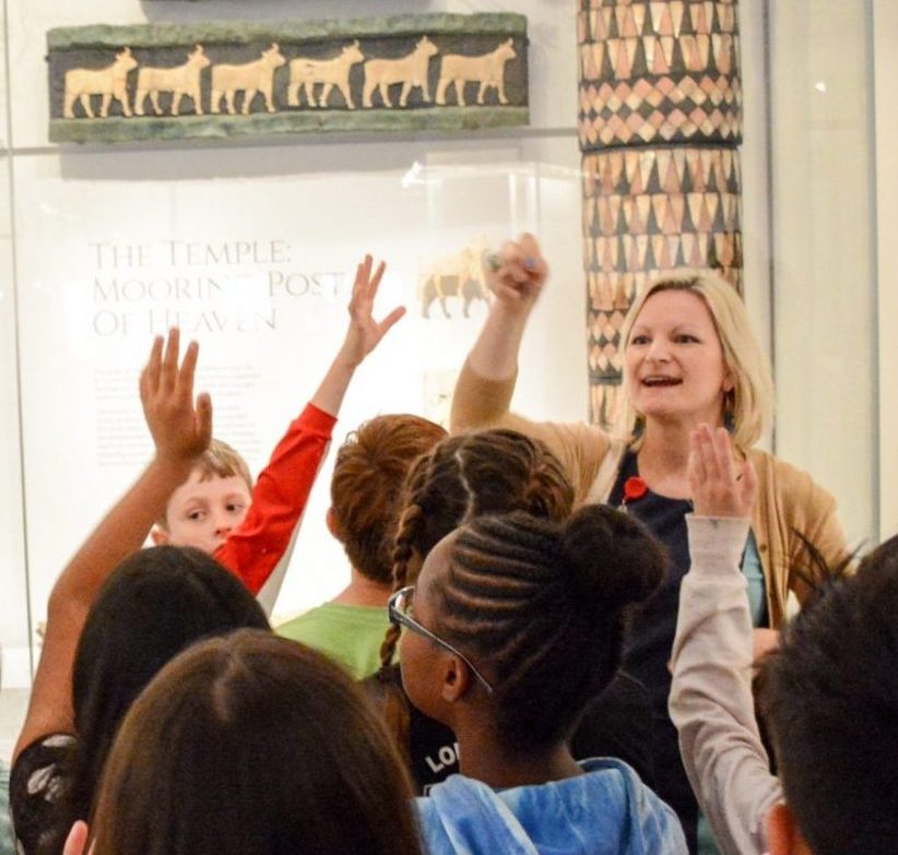 Students engage with a Museum educator in the Middle East Gallery