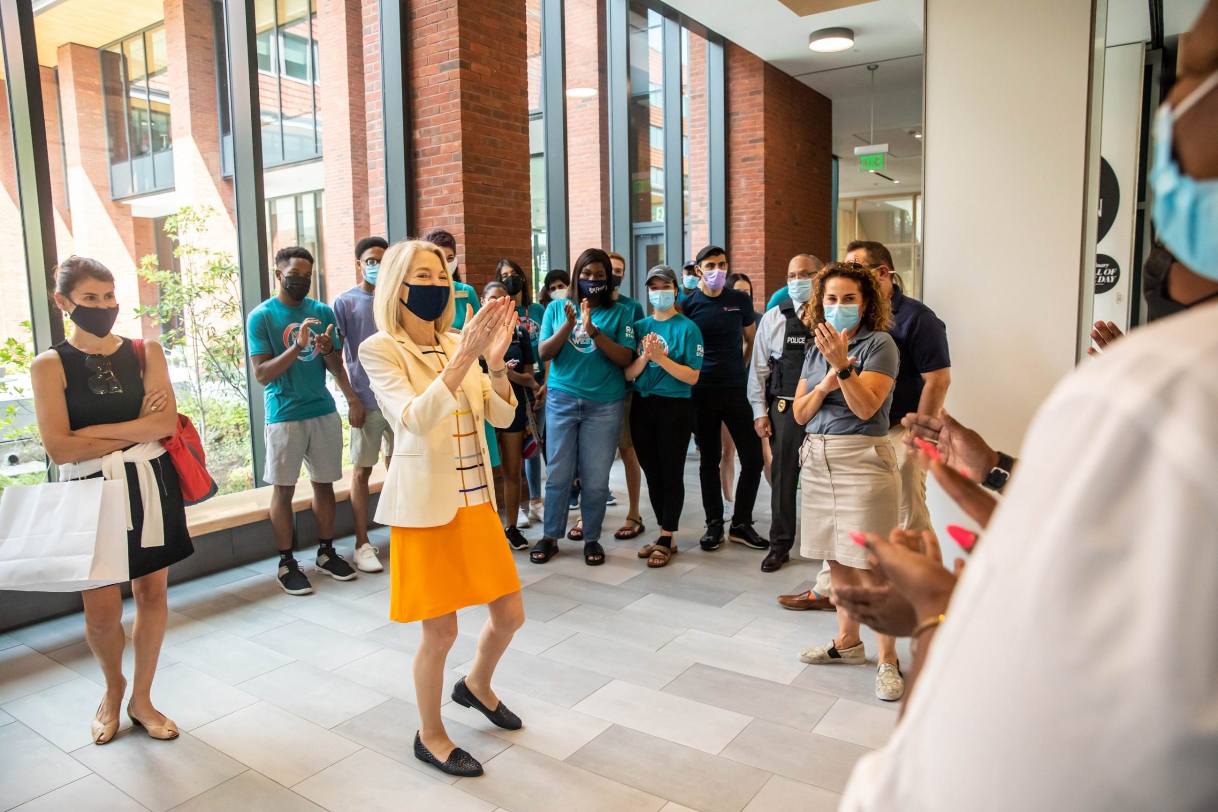 Penn President Amy Gutmann greets staff and mingles with students in New College House