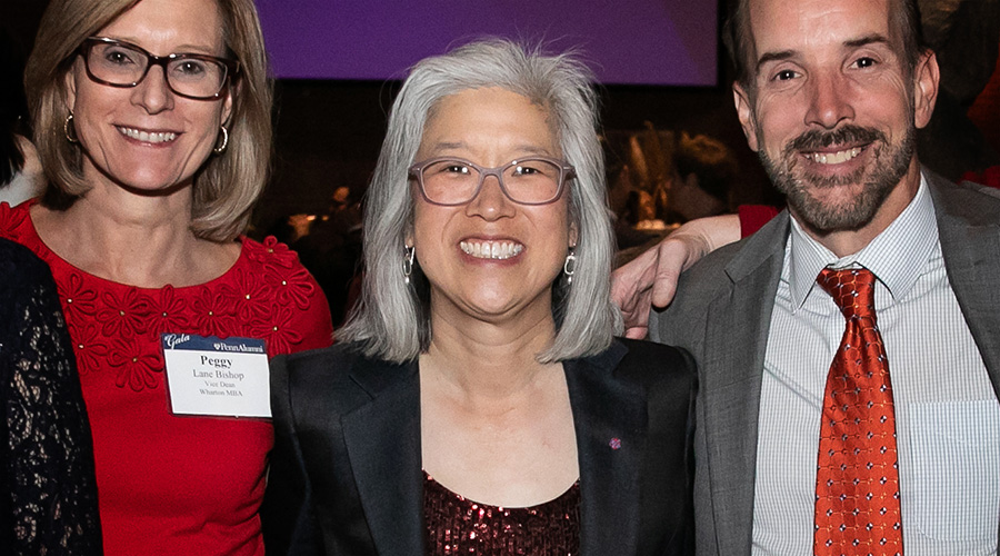 An image of Joan Lau with fellow Penn alumni at the Penn Alumni Award of Merit celebration.