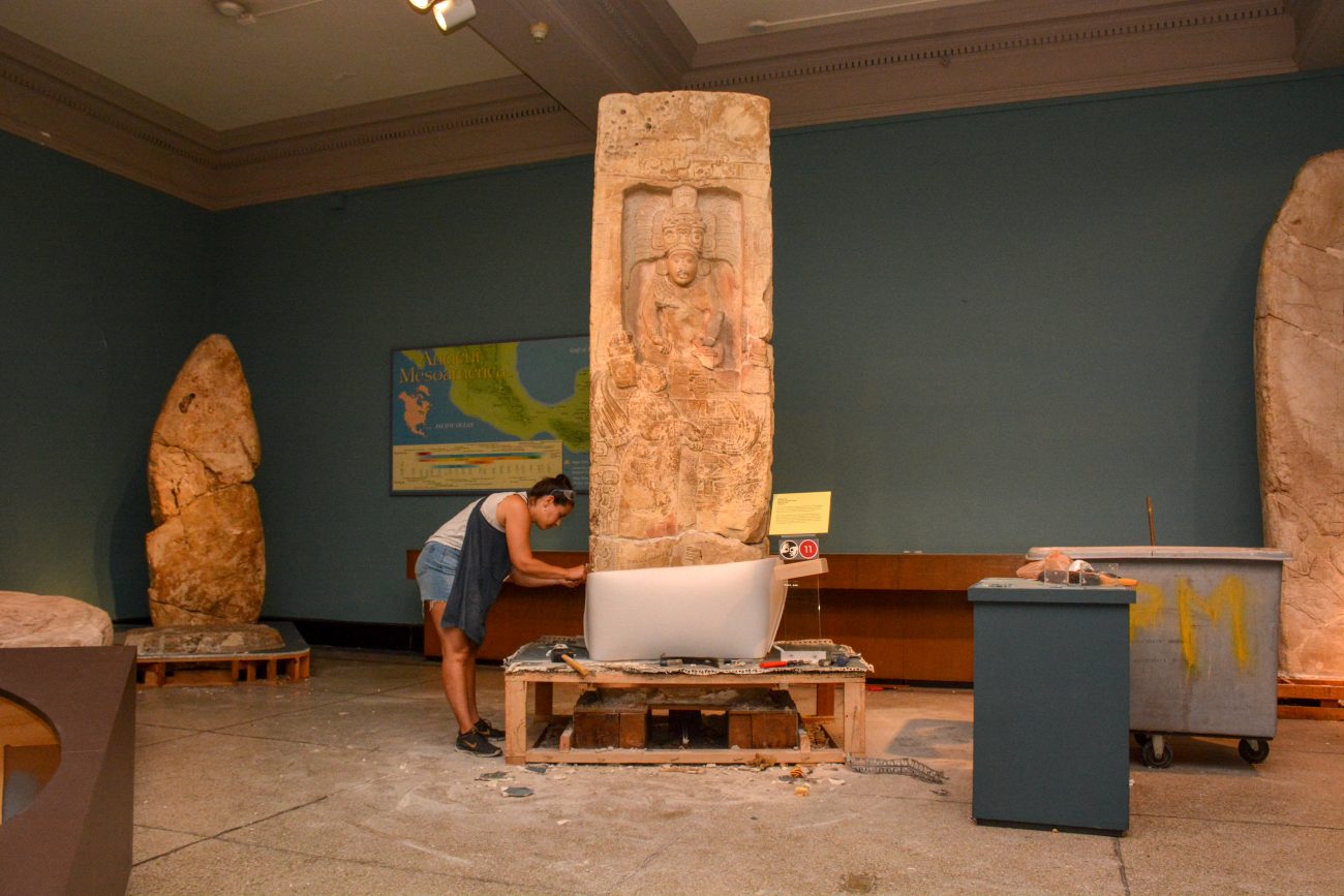 Alexis attends to the famous Stela 14 from Piedras Negras, Guatemala in preparation for its move to a new location in the upcoming Mexico and Central America Gallery.