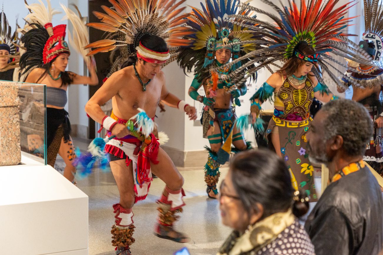 a group performing an Aztec dance