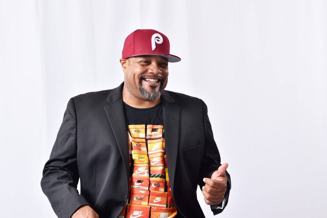 Rennie Harris smiles and shows a thumbs up