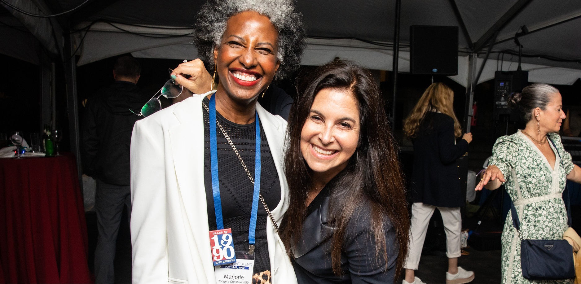 alumni dancing and posing for photos