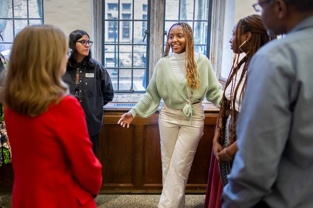 Tarah Paul, C’24, was one of the students who gave a tour of the new mural to President Liz Magill in mid-February.