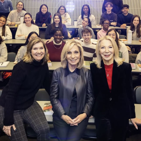Annenberg Dean Sarah Banet-Weiser, journalist Andrea Mitchell, CW’67, and Penn President Emerita Amy Gutmann pose in front of a classroom full of students.
