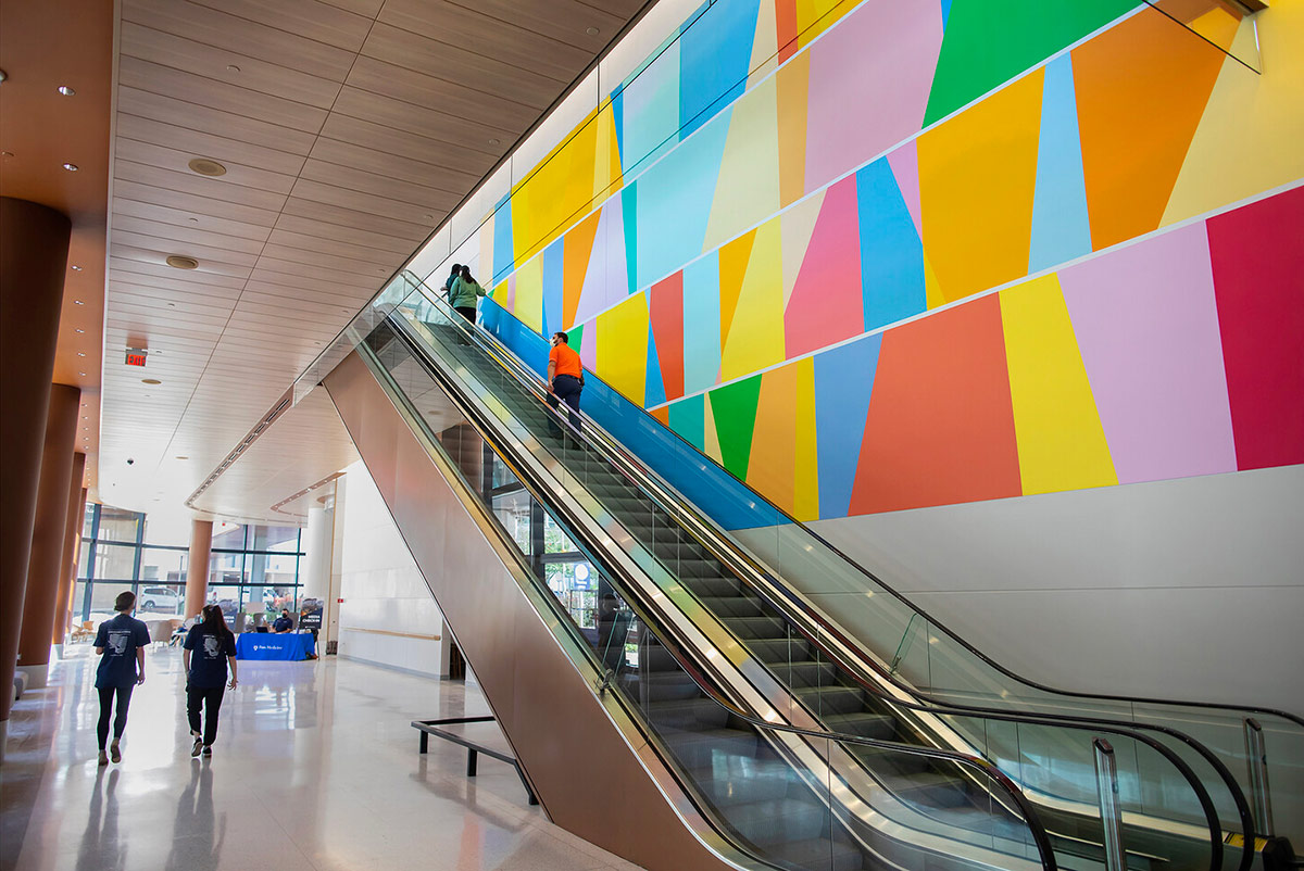 Colorful mural art at the Clifton Center for Medical Breakthroughs, enhancing the healing environment for patients and families.