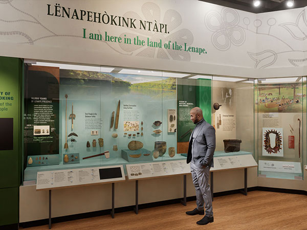Man viewing the Native North America Gallery at the Penn Museum.