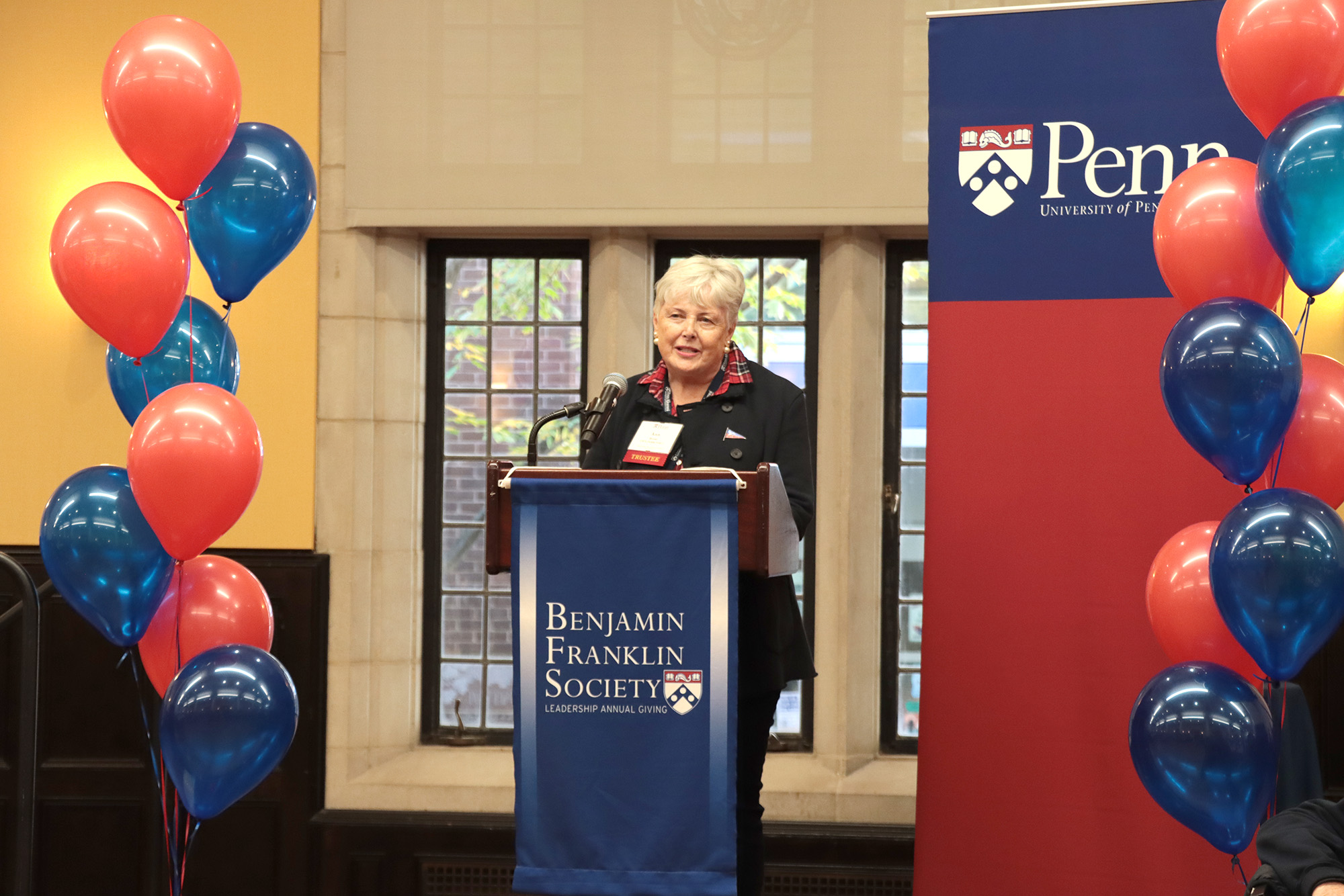 Penn Alumni President and University Trustee Ann Reese, CW’74, PAR’06, PAR’12, addresses members of the Benjamin Franklin Society during the 2022 Homecoming Brunch at the University of Pennsylvania.