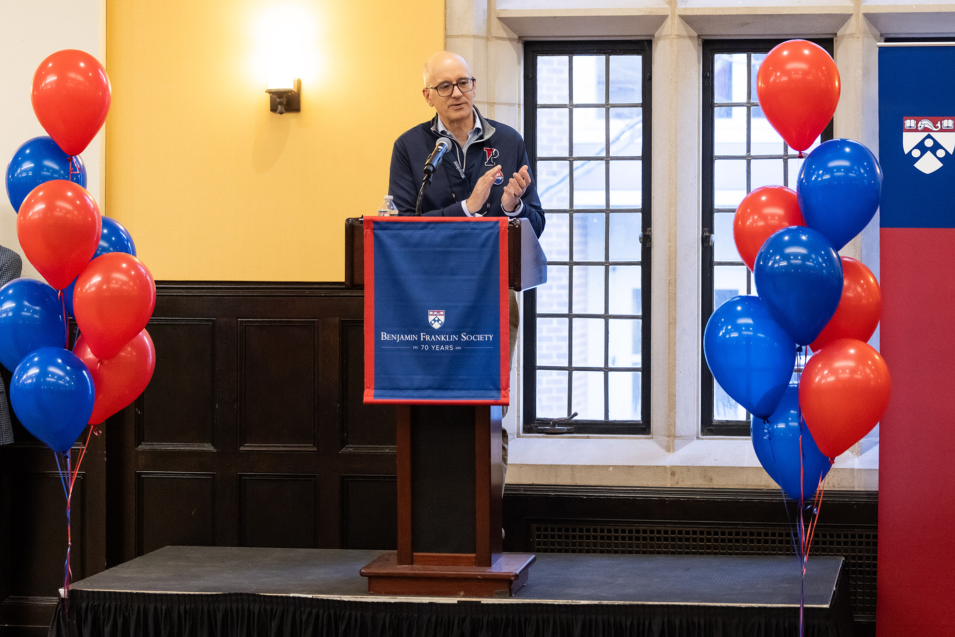 Jim Husson, Vice President of Development & Alumni Relations, speaks to the audience from the podium at the 2024 Benjamin Franklin Society Brunch.