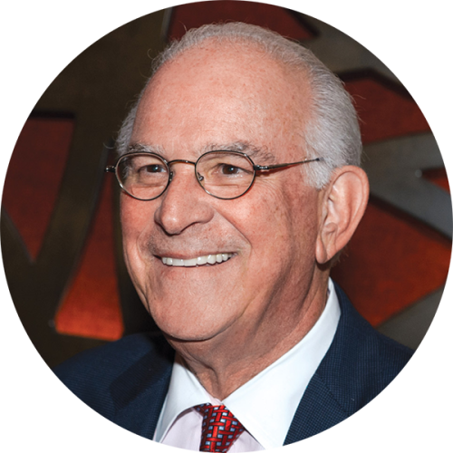 A close-up headshot image of Steve Cozen, C’61, L’64, who is shown smiling and looking off to the right.