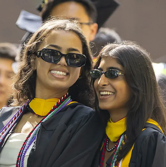 A group of students celebrates Commencement, symbolizing the transformational opportunities donor support helps make possible.