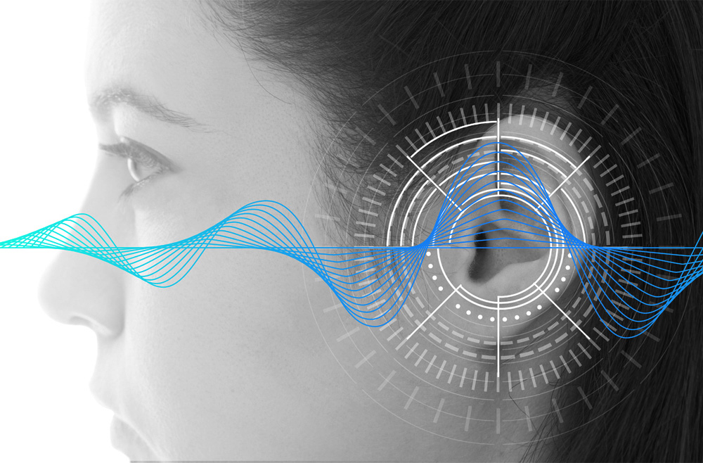 A side view of a young woman's head with an illustration drawing focus to her ear.