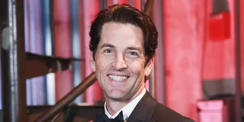 Kyle Kozloff, W'90, an advocate for the performing arts at the University of Pennsylvania, smiles for the camera during the 2017 Alumni Award of Merit ceremony.