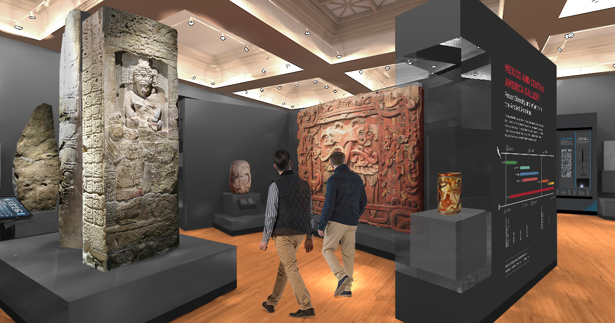 two men at museum viewing maya artifacts