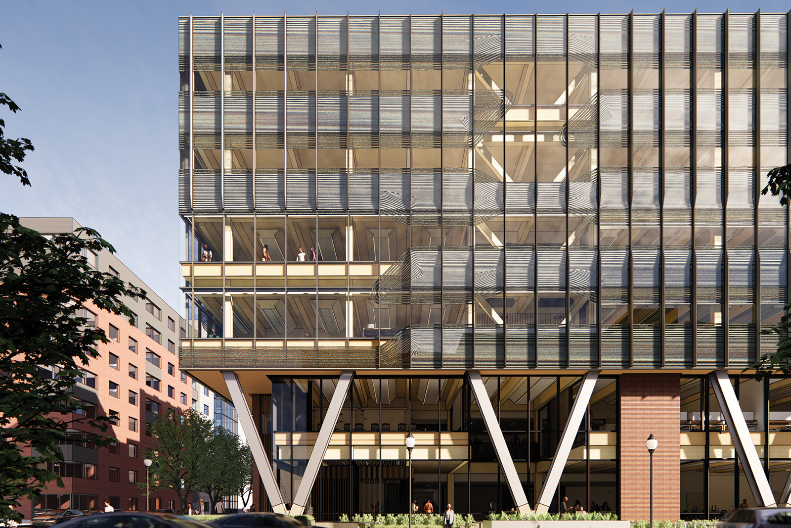 Modern multi-level building with distinctive architecture, featuring open balconies protected by vertical metal screens. Large angled beams support the structure, with a dynamic and spacious ground floor. People are visible on the balconies, set against a backdrop of urban buildings and green trees.