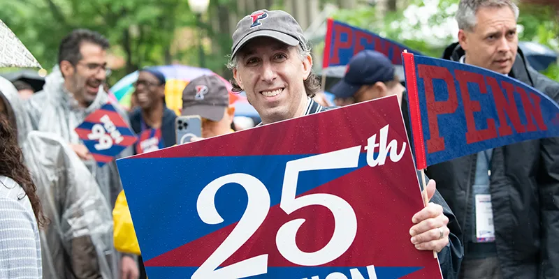 Alumni gather during a 25th Reunion parade—one of many ways to engage with The Penn Fund and celebrate Penn pride.
