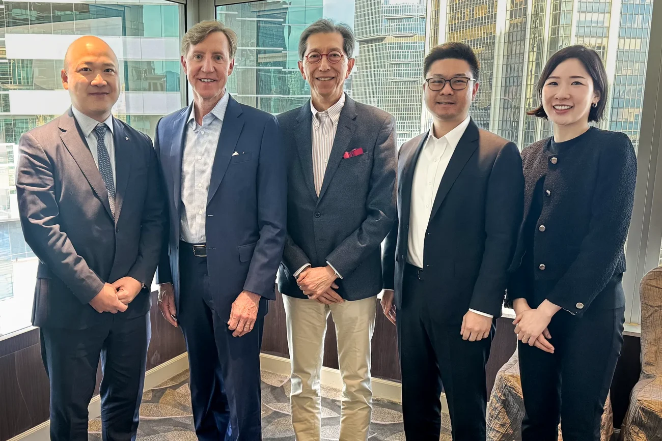 Penn President J. Larry Jameson joins alumni donors at a Hong Kong event celebrating the Penn Asia Matched Scholarship launch.