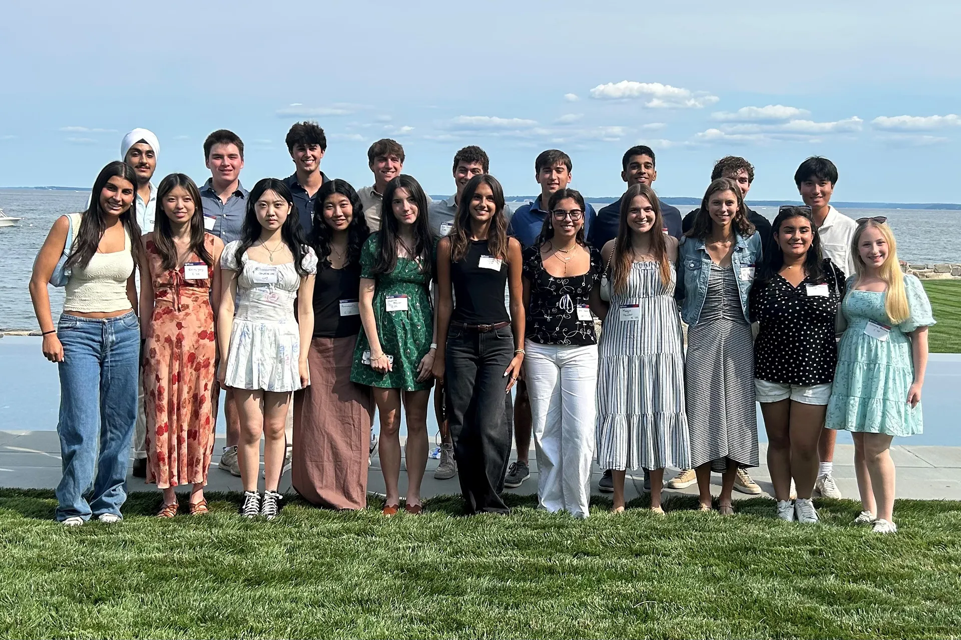 Incoming Penn students pose for a group photo together during a welcome reception in Greenwich.
