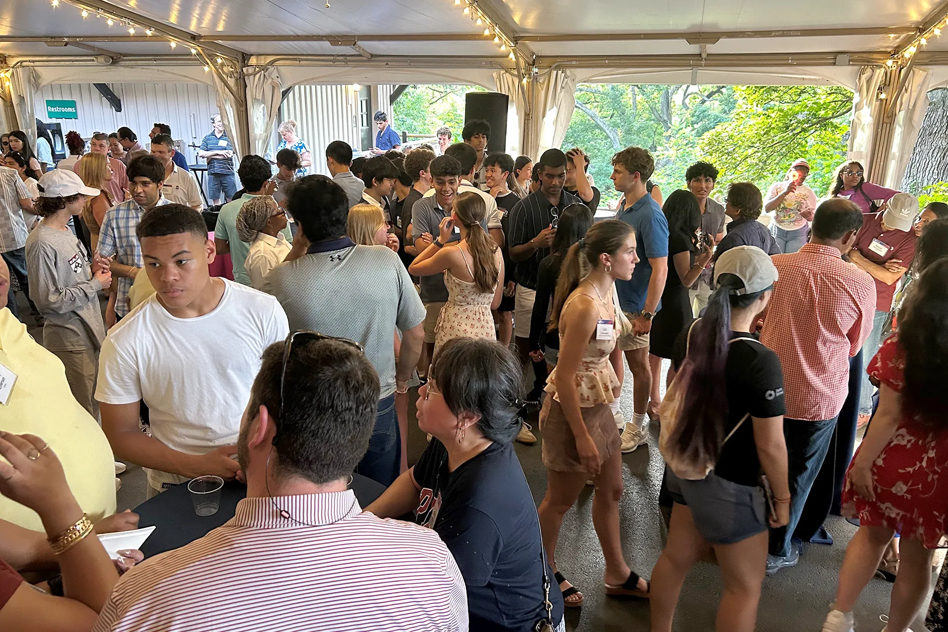 Incoming Penn students mingle and chat during a welcome reception in Philadelphia.