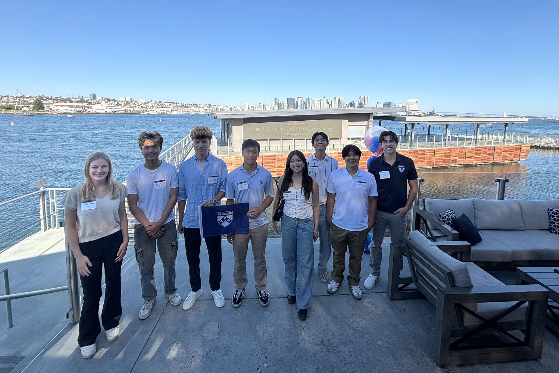 Incoming Penn students pose for a group photo together during a welcome reception in San Diego.