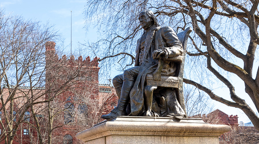 A side view of the statue of Benjamin Franklin on College Green at the University of Pennsylvania.