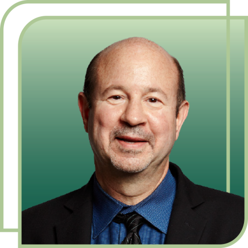 A portrait of Michael Mann set against a green background.