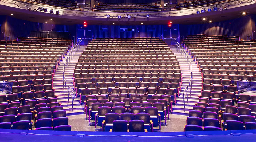 Penn Live Arts' Zellerbach Theater offers a spacious, beautifully lit performance hall with sleek rows of seats and sweeping balcony views.